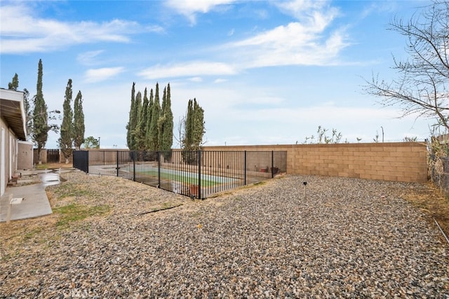 view of yard with a fenced backyard and a patio