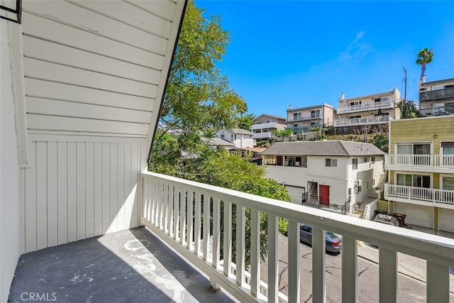 balcony featuring a residential view