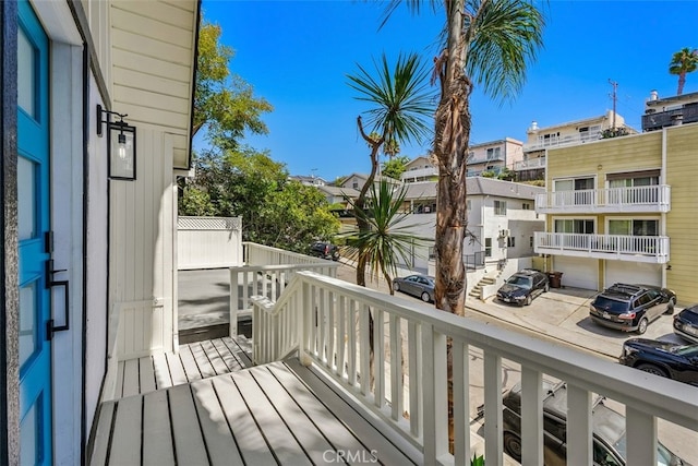 balcony featuring a residential view