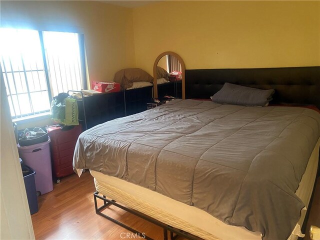 3158 E E Ave H8, Lancaster, CA 93535 - bedroom featuring wood finished floors