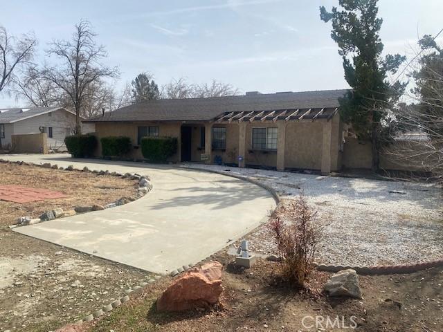 3158 E E Ave H8, Lancaster, CA 93535 - ranch-style house with curved driveway