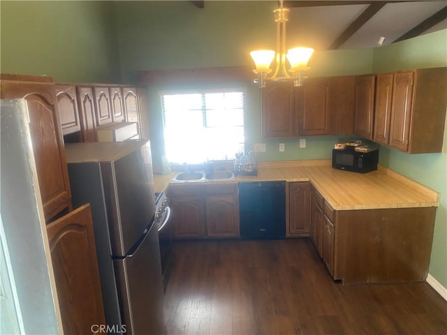 3158 E E Ave H8, Lancaster, CA 93535 - kitchen featuring black appliances, dark wood-style floors, light countertops, a chandelier, and a sink