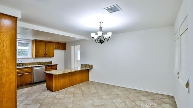 kitchen featuring brown cabinets, visible vents, a sink, dishwasher, and a peninsula