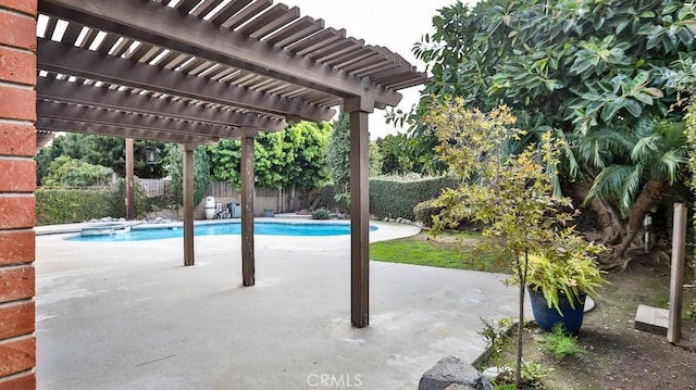 view of patio with a fenced backyard, a fenced in pool, and a pergola