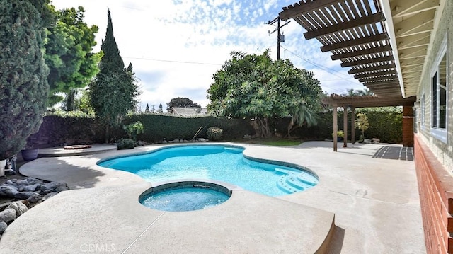 view of swimming pool with an outdoor fire pit, a fenced backyard, a pool with connected hot tub, a pergola, and a patio area