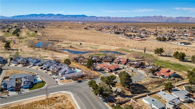 bird's eye view with a residential view and a mountain view