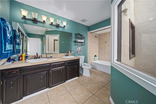 full bathroom with tile patterned flooring, visible vents, and a sink