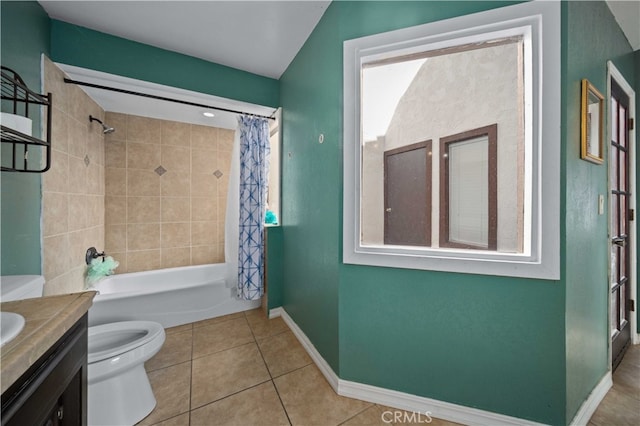 full bath featuring toilet, shower / tub combo, vanity, tile patterned flooring, and baseboards