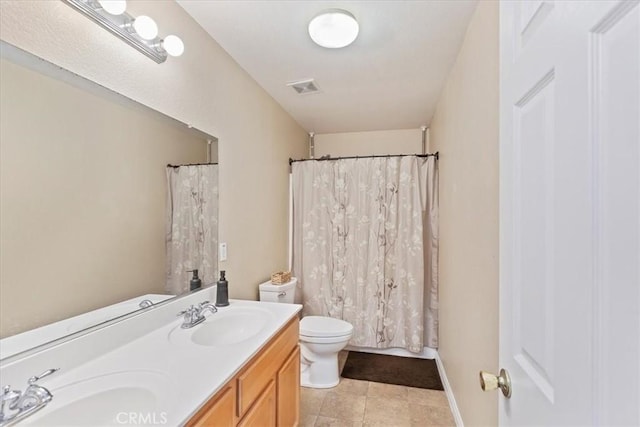 full bath featuring toilet, tile patterned flooring, visible vents, and a sink