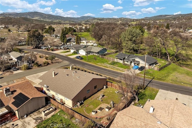 bird's eye view with a residential view and a mountain view