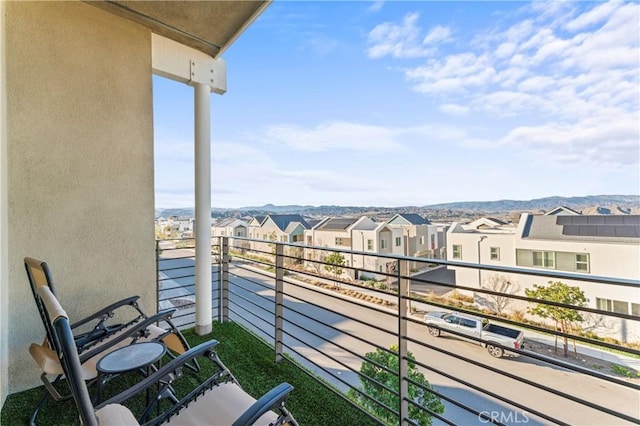 balcony featuring a residential view