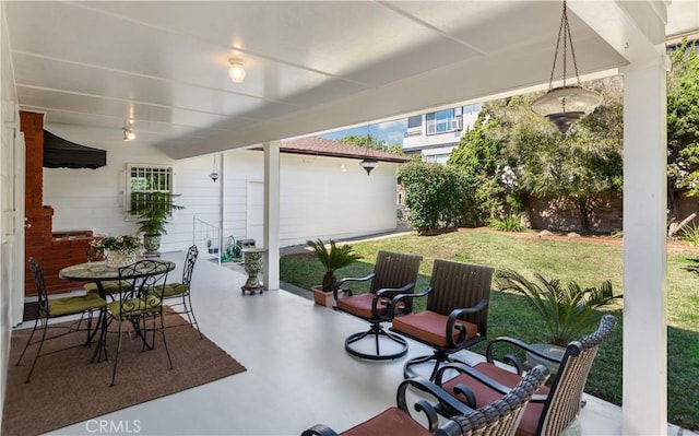 view of patio featuring outdoor dining space