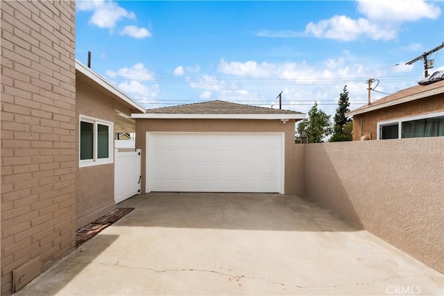 detached garage with fence