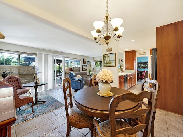 dining area featuring recessed lighting, a notable chandelier, and light tile patterned floors