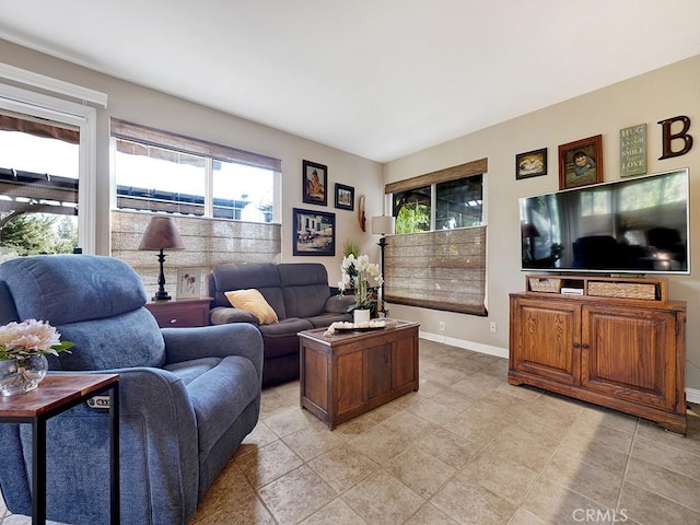 living room featuring baseboards