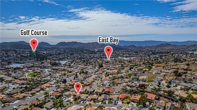 birds eye view of property with a residential view and a mountain view