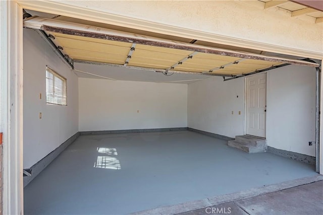 garage with baseboards