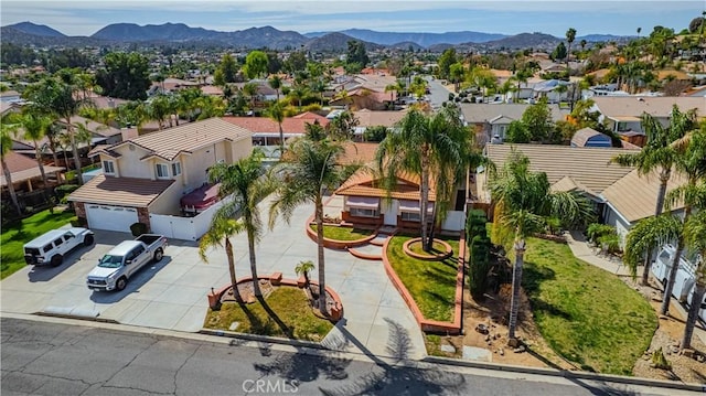 aerial view featuring a mountain view and a residential view