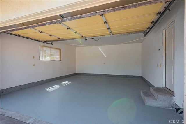 garage with baseboards