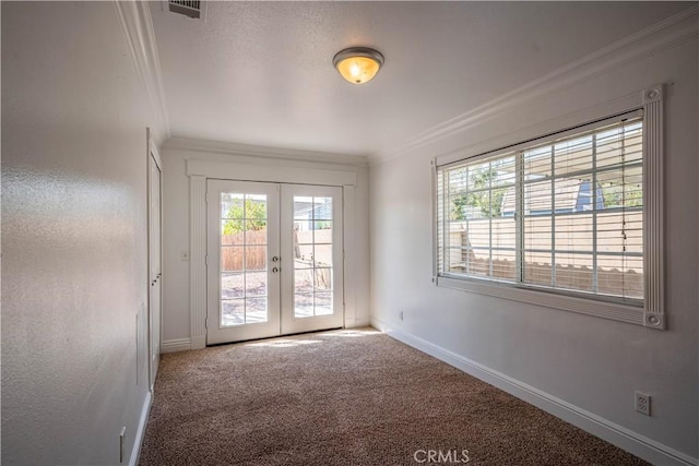 doorway to outside featuring carpet, french doors, visible vents, ornamental molding, and baseboards