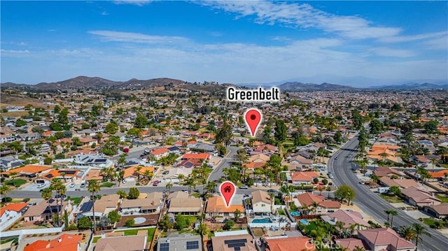 bird's eye view with a residential view and a mountain view