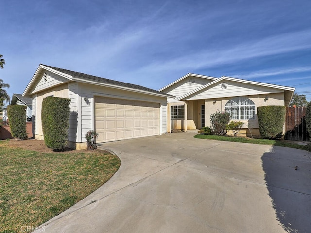 ranch-style house with concrete driveway and a front yard