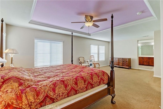 bedroom with ceiling fan, ornamental molding, carpet, and a raised ceiling