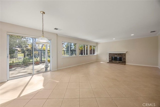 unfurnished living room with light tile patterned flooring, visible vents, and baseboards