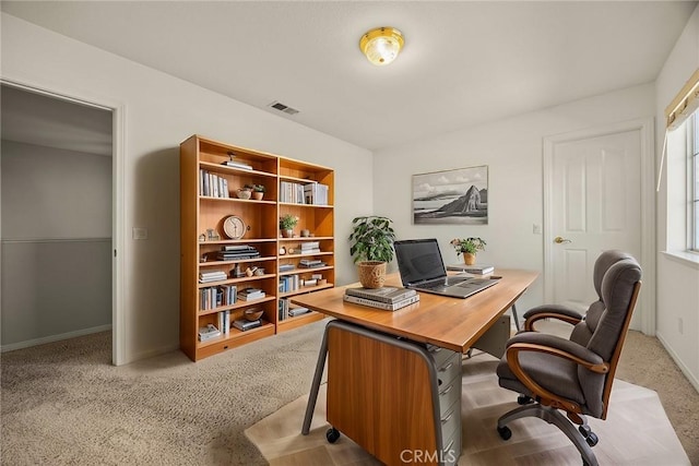 office area featuring carpet and visible vents