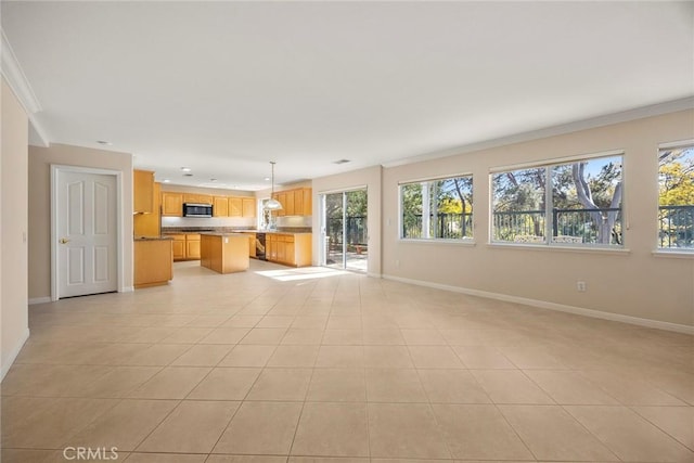 unfurnished living room with light tile patterned floors, crown molding, and baseboards