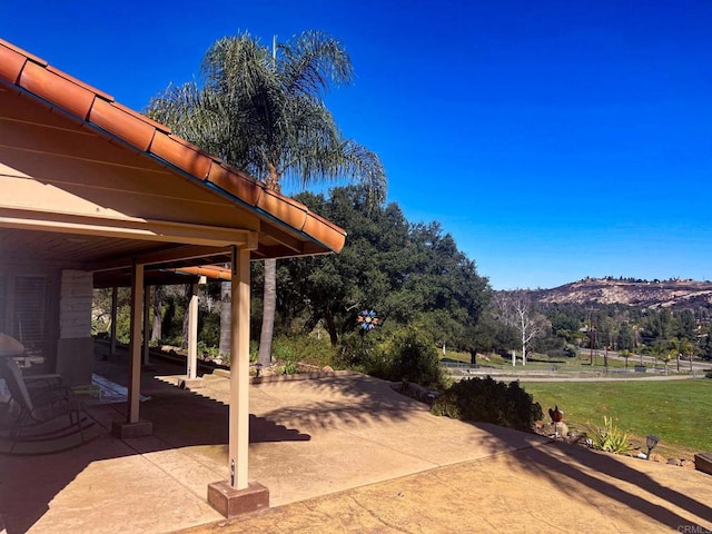 view of patio with a mountain view