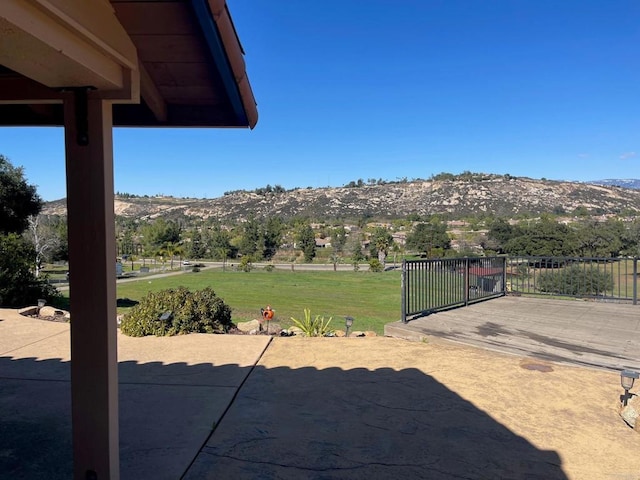 view of patio / terrace with a mountain view