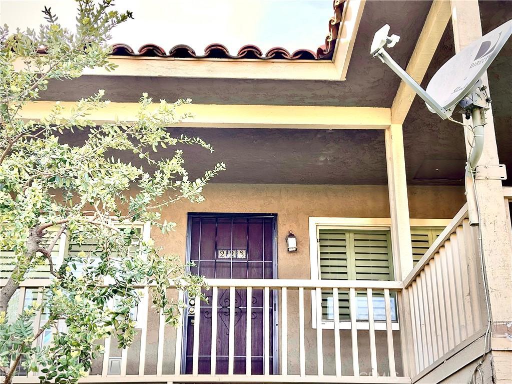 doorway to property with stucco siding