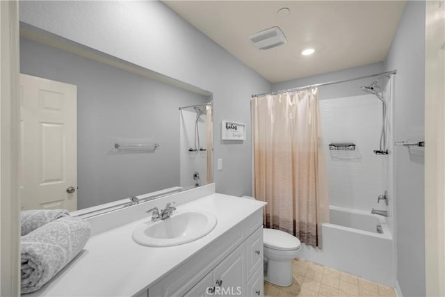 bathroom featuring shower / tub combo, visible vents, vanity, and toilet