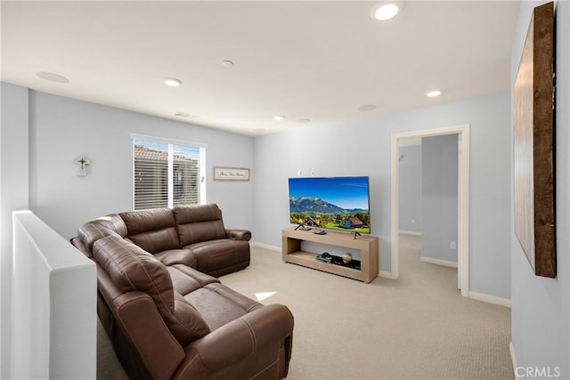 carpeted living room with recessed lighting, visible vents, and baseboards