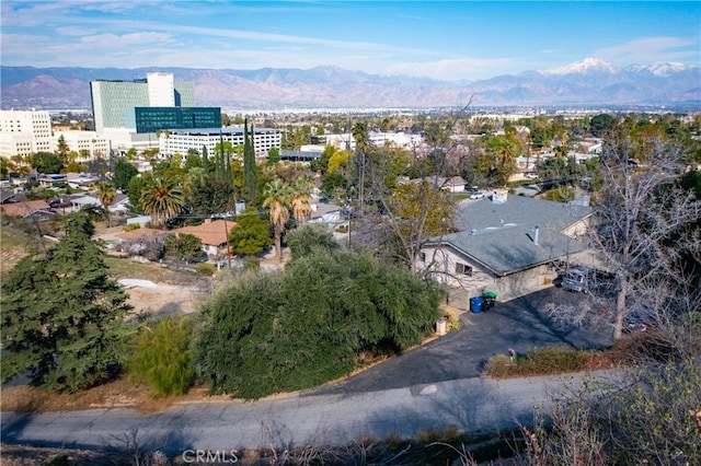 aerial view with a mountain view and a city view