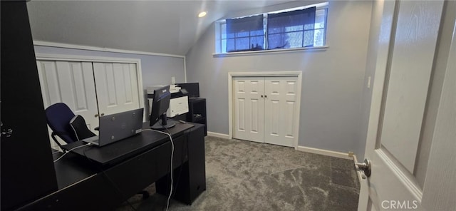 office area with carpet, vaulted ceiling, and baseboards