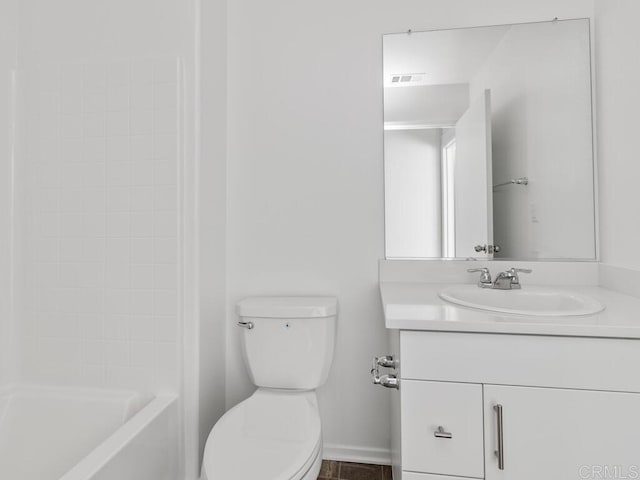 5106 Belle Way, Hemet, CA 92545 - full bathroom with baseboards, visible vents, vanity, and toilet