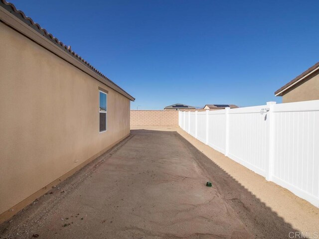 5106 Belle Way, Hemet, CA 92545 - view of side of property with a fenced backyard and stucco siding