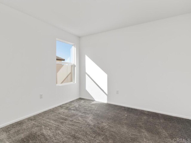 5106 Belle Way, Hemet, CA 92545 - carpeted empty room with baseboards