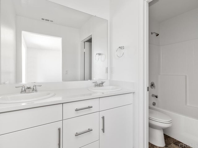 5106 Belle Way, Hemet, CA 92545 - bathroom featuring visible vents, double vanity, a sink, and toilet