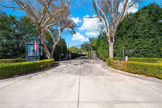 surrounding community featuring a gate