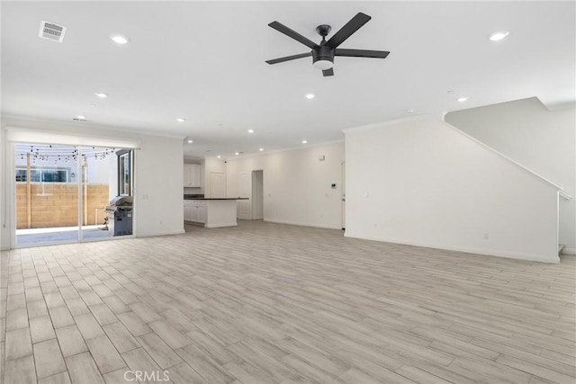 3235 E Yellowstone Dr, Ontario, CA 91762 - unfurnished living room with a ceiling fan, crown molding, light wood finished floors, and visible vents