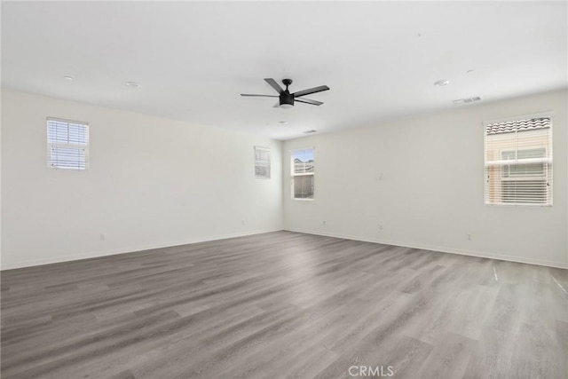 3235 E Yellowstone Dr, Ontario, CA 91762 - spare room with baseboards, ceiling fan, and wood finished floors