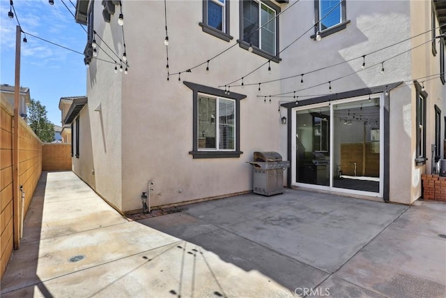 3235 E Yellowstone Dr, Ontario, CA 91762 - back of house with a fenced backyard, stucco siding, and a patio area