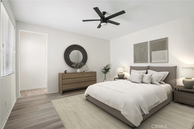 3235 E Yellowstone Dr, Ontario, CA 91762 - bedroom with baseboards, light wood-style flooring, and ceiling fan