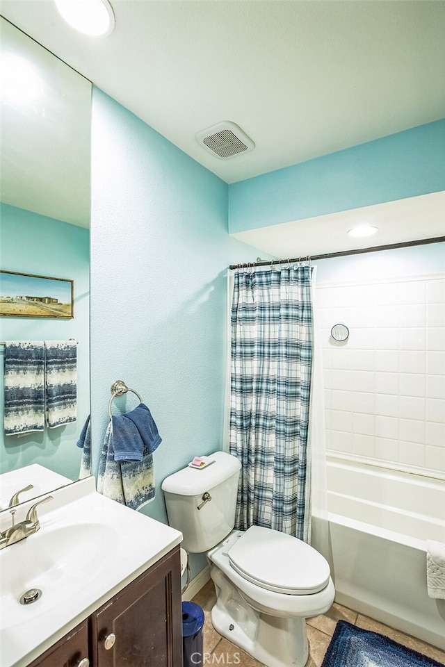 full bath featuring shower / tub combo with curtain, visible vents, toilet, vanity, and tile patterned flooring