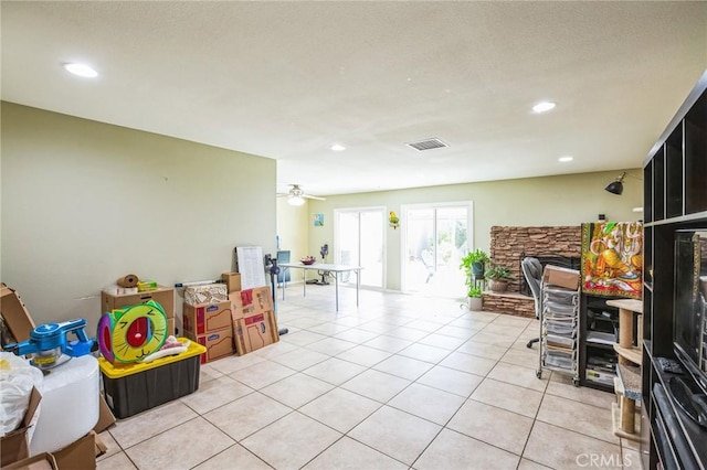 playroom with a ceiling fan, recessed lighting, light tile patterned flooring, and visible vents