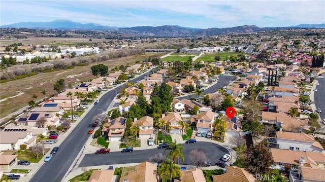 birds eye view of property featuring a residential view and a mountain view