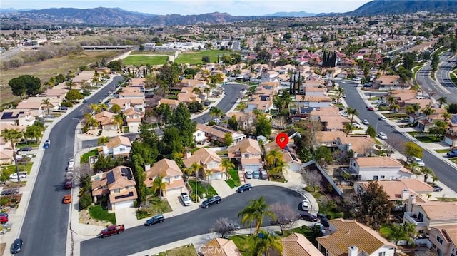 aerial view featuring a residential view and a mountain view